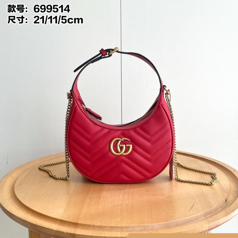 G*u*i top handle bags